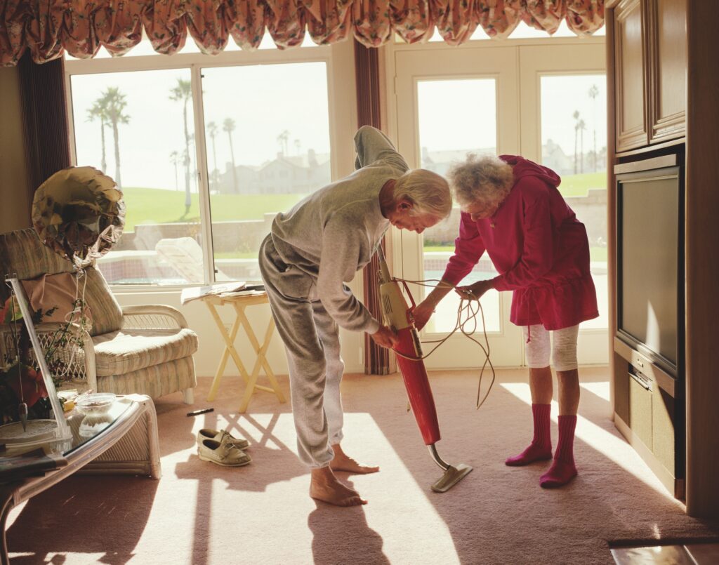 Larry Sultan. Fixing the Vacuum, 1991, from the series Pictures from Home. © Larry Sultan. Courtesy of Yancey Richardson Gallery; Casemore Gallery; Estate of Larry Sultan